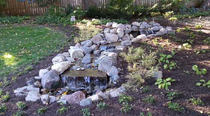 Backyard Garden Tiered Waterfall Landscaping Omaha Nebraska