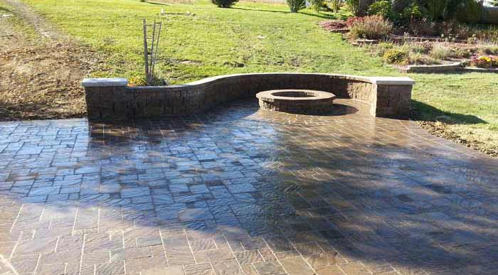 Firepit | Paved Patio with Curved Stone Capped Wall | Omaha Nebraska