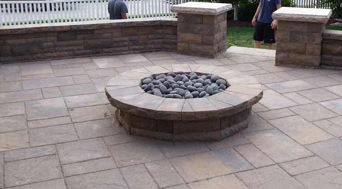 Firepit Landscape Design | Stone Capped Wall with Paved Patio