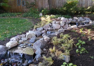 backyard-garden-tiered-waterfall-landscaping-009