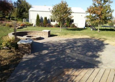 firepit-with-curved-retaining-wall-stoned-paved-patio-007