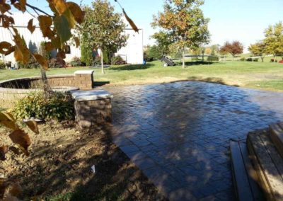 firepit-with-curved-retaining-wall-stoned-paved-patio-008