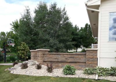 firepit-with-stone-paved-patio-and-capped-stone-wall-4