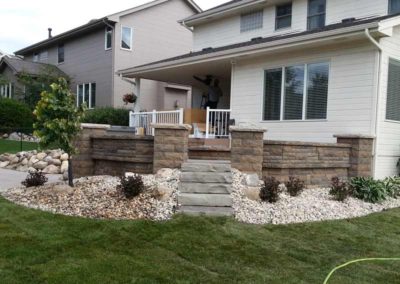 firepit-with-stone-paved-patio-and-capped-stone-wall-6