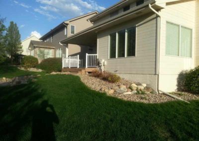 firepit-with-stone-paved-patio-and-capped-stone-wall-before-3