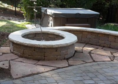 stone-capped-firepit-paved-backyard-patio-005