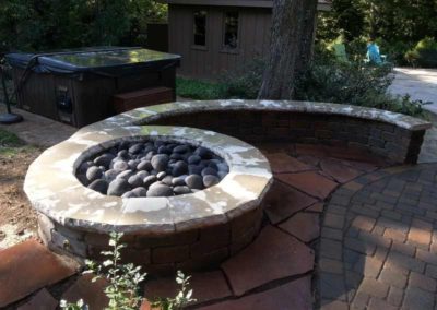 stone-capped-firepit-paved-backyard-patio-009